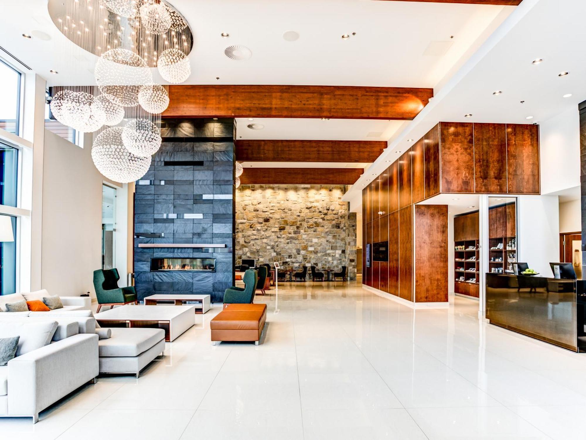Otl Gouverneur Saguenay Exterior photo The lobby of the Ritz-Carlton, Downtown, Los Angeles